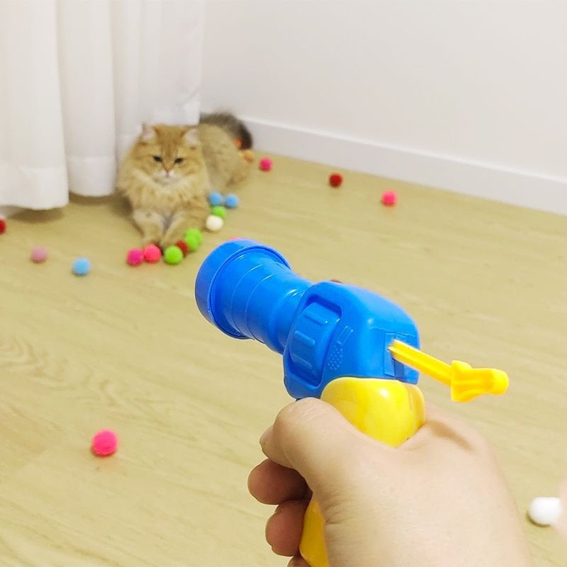 Pistola interactiva para gatos